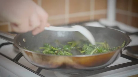 Spinach in a pan Stock Footage 126161887