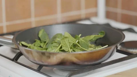 Spinach in a pan Stock Footage 126163079