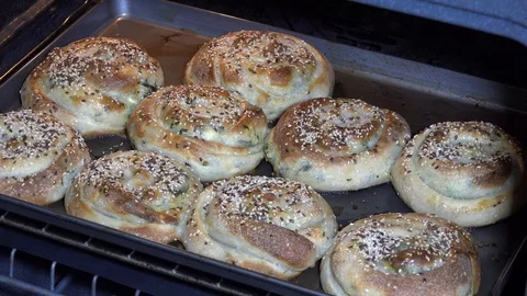 Spinach pies baking in oven 2 Stock Footage 106648053