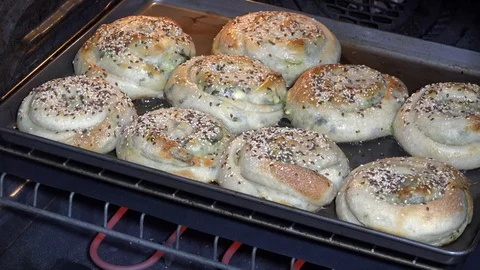 Spinach pies baking in oven Stock Footage 106648057