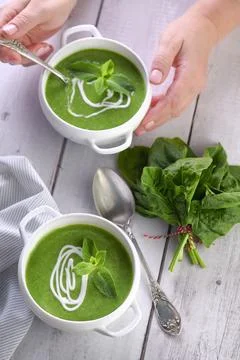 Spinach puree soup Stock Photos