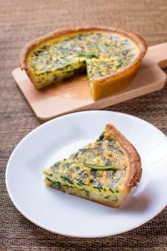 Spinach quiche portion Stock Photos