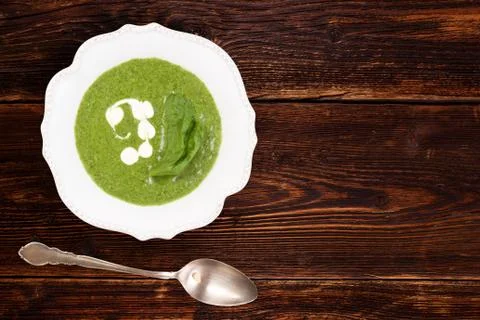 Spinach soup background with copy space. Stock Photos