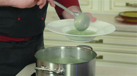 Spinach soup is being given the finishing touches Stock Footage 50758006