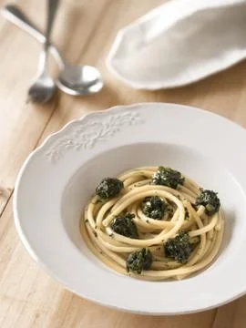 Spinach spaghetti pasta Stock Photos