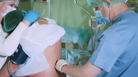 Spinal anesthesia injection, epidural anesthesia or nerve block Stock Footage 254916488