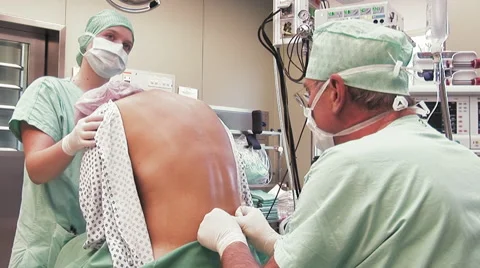 Spinal Anesthesia By Surgical Team Stock Footage 67278042