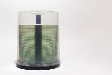 Spindel of big cake box for compact discs, visible through the translucent .. Stock Photos