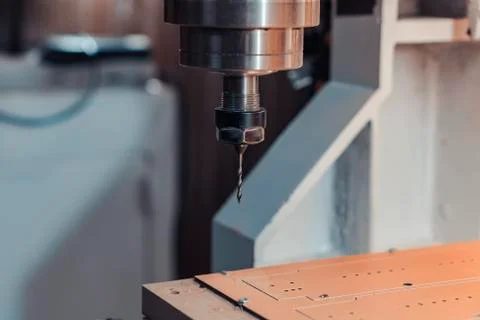 Spindle with a milling cutter inserted into the collet. cnc machine. Stock Photos