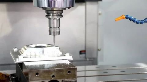 Spindle rotate over workpiece to demonstrate machining process Stock Footage 130228415