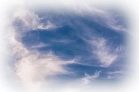 Spindrift clouds with a vignette Stock Photos