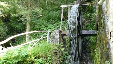 Spining Old Mill Wheel, front view, slow motion Stock Footage 145053909