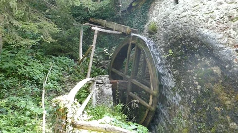 Spining Old Mill Wheel, lateral view, slow motion Stock Footage 145053851