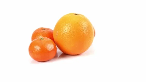 Spining orange fruit on the white background Video stock 220023309
