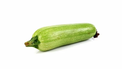 Spining vegetable marrow on the white background Stock Footage 220092913
