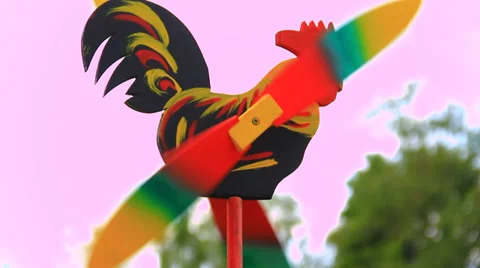 Spining windmill with cock motif Stock Footage 39847769