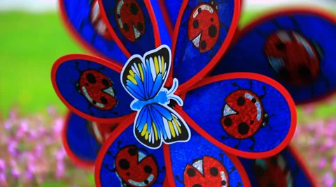 Spining windmill with ladybird motif Stock Footage 39847770