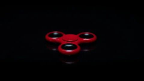 Spinner on the black mirror surface Stock Footage 92481718