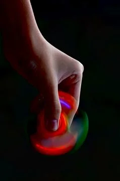 Spinner on Dark Background Stock Photos