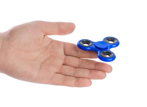 Spinner in hand Spinner in hand isolated on white background Copyright: xZ... Stock Photos