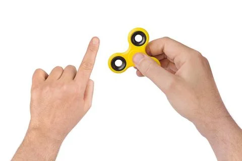 Spinner in hand Spinner in hand isolated on white background Copyright: xZ... Stock Photos
