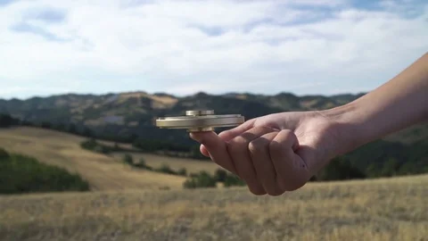 Spinner spinning on a finger Stock Footage 78141188