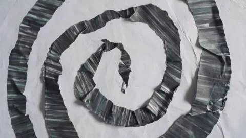 Spinning Abstract Black and White Paper Coiled Shape with Tactile Texture Stock Footage 331915553