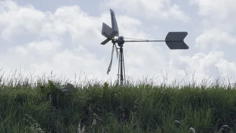 Spinning agricultural wind pump summer timelapse Stock Footage 336814149