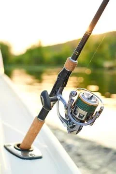 Spinning in the back of the ship on the background of the river Stock Photos