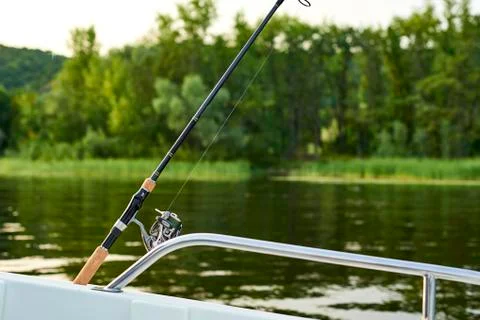 Spinning in the back of the ship on the background of the river Stock Photos