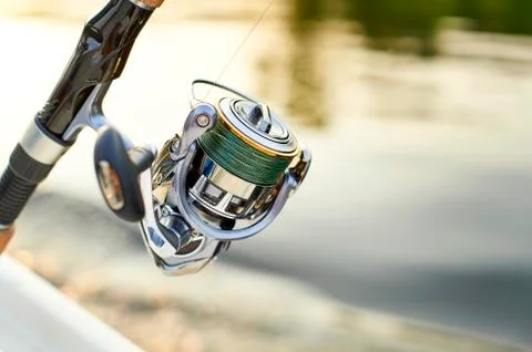 Spinning in the back of the ship on the background of the river Stock Photos