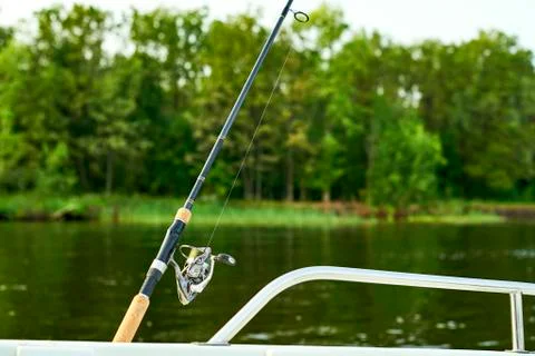 Spinning in the back of the ship on the background of the river Stock Photos