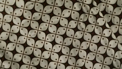Spinning batik fabric, Indonesia unique pattern textile, textured background Stock Footage 273295532