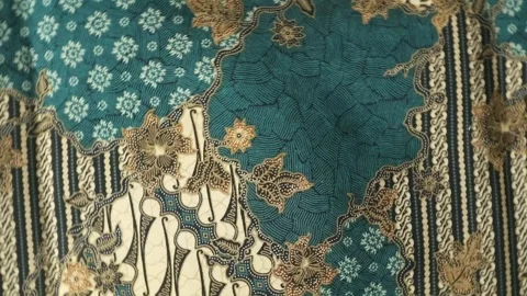 Spinning batik fabric, Indonesia unique pattern textile, textured background Stock Footage 273295567