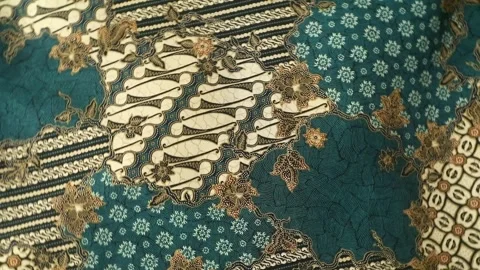 Spinning batik fabric, Indonesia unique pattern textile, textured background Stock Footage 273295656