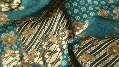 Spinning batik fabric, Indonesia unique pattern textile, textured background Stock Footage 273295664