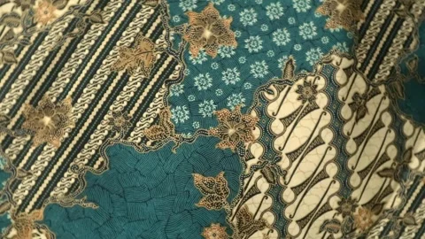 Spinning batik fabric, Indonesia unique pattern textile, textured background Stock Footage 273295751