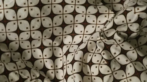 Spinning batik fabric, Indonesia unique pattern textile, textured background Stock Footage 273295752