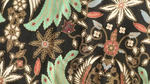 Spinning batik fabric, Indonesia unique pattern textile, textured background Stock Footage 273295757