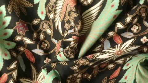 Spinning batik fabric, Indonesia unique pattern textile, textured background Stock Footage 273295842