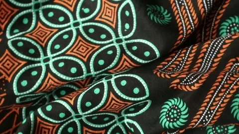Spinning batik fabric, Indonesia unique pattern textile, textured background Stock Footage 273295965