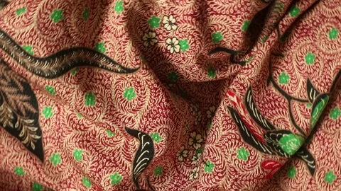 Spinning batik fabric, Indonesia unique pattern textile, textured background Stock Footage 273295988