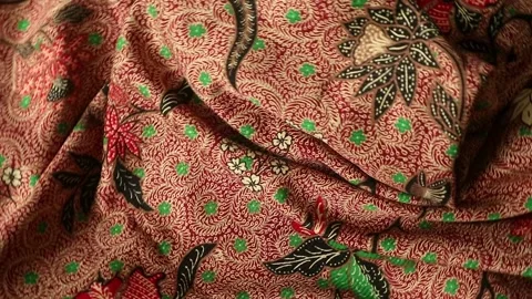 Spinning batik fabric, Indonesia unique pattern textile, textured background Stock Footage 273296167