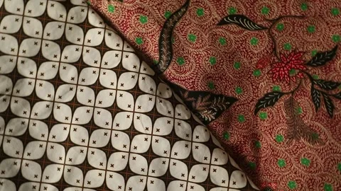 Spinning batik fabric, Indonesia unique pattern textile, textured background Stock Footage 273296441