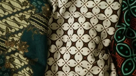 Spinning batik fabric, Indonesia unique pattern textile, textured background Stock Footage 273296852