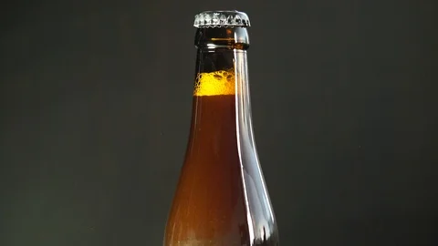 Spinning beer bottle Stock Footage 114489610