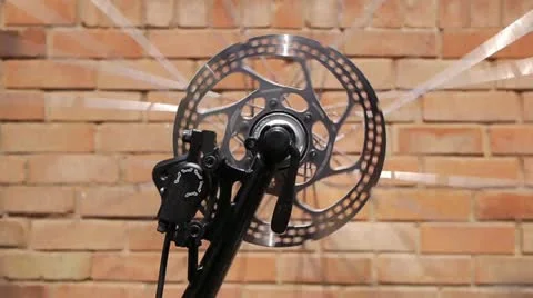 Spinning bicycle wheel. Stock Footage 12036039