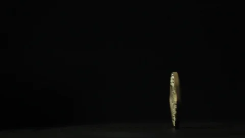 Spinning bitcoin against a black backdrop Stock Footage 88515218