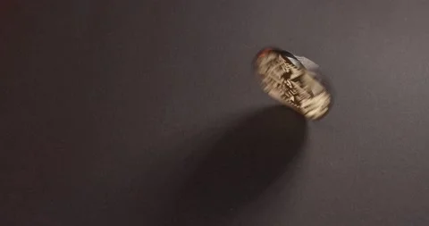 Spinning Bitcoin on dark surface. BTC Cryptocurrency Stock-Footage 172116560
