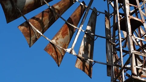Spinning blades of an old wind pump Stock Footage 106300919